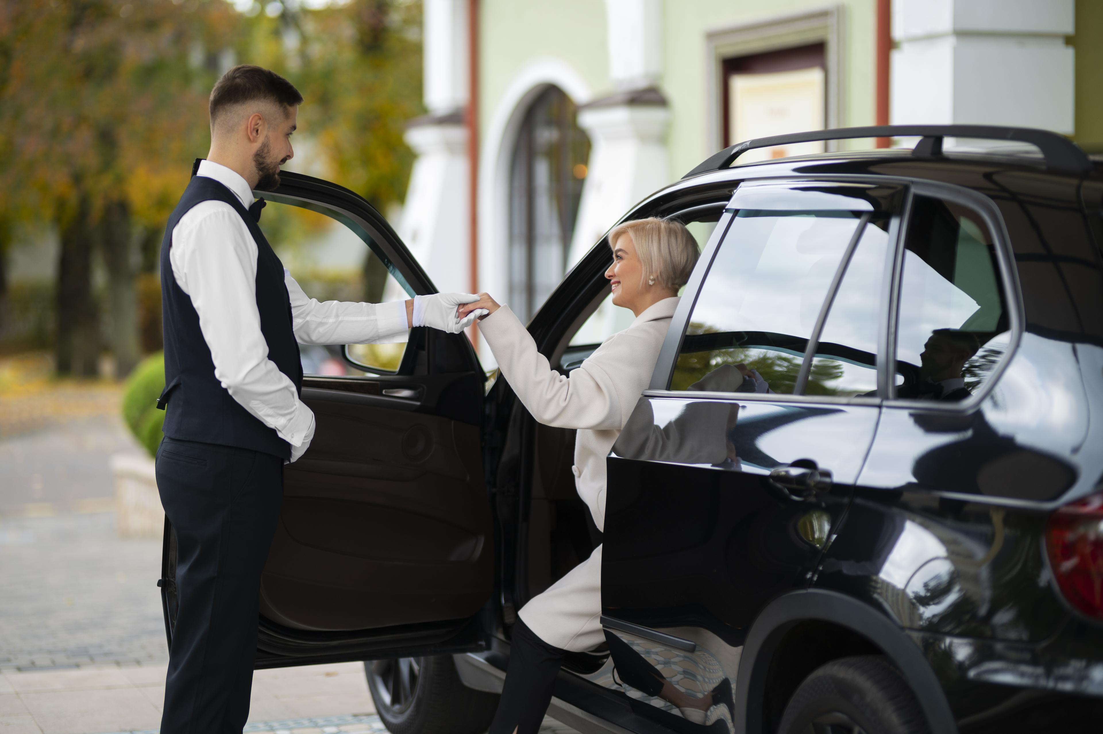 Guest handing over car keys to the valet